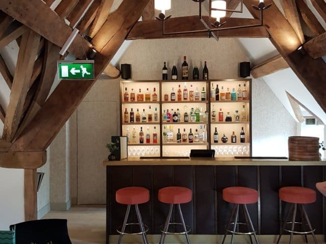 The Mill bar located in a high gallery overlooking the restaurant offers a quiet area to sit and enjoy a drink.