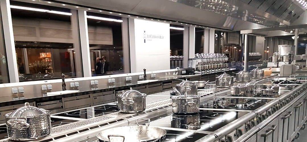 Court Catering designed and supplied commercial student training kitchen fitted with induction cookline.